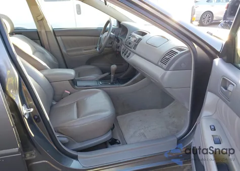 2003 Toyota Camry Le from USA, damaged, VIN 4T1BE32K93U670276